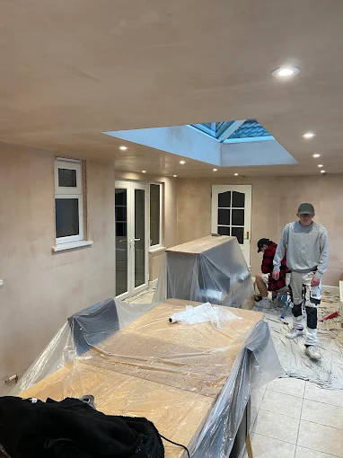 Kitchen diner masked and prepared for spray finishing